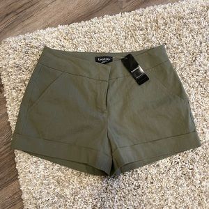 Bebe cuffed trouser shorts in olive green!